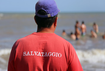 Lifeguard and the red Jersey with RESCUE written in italian