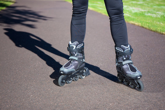 close up view of legs in roller blades