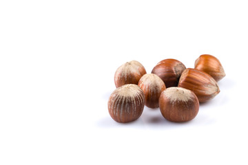 Hazelnuts on white