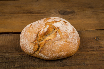 white bread over wooden background