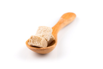 brown sugar in a wooden spoon