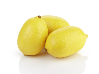 three fresh ripe lemons isolated on white