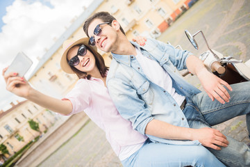 Young couple on scooter