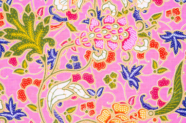 Fototapeta na wymiar Abstract bright textile in batik's.