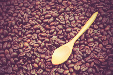 Coffee beans and wooden spoon with filter effect retro vintage s