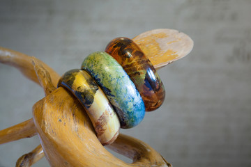 Bracelet on his hand from a tree