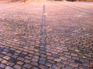 Stone pavement reflecting sunset light