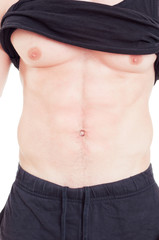 Naklejka premium Close-up with fitness instructor male torso and abs