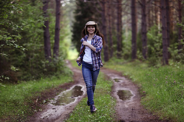 Obraz premium running girl forester in nature