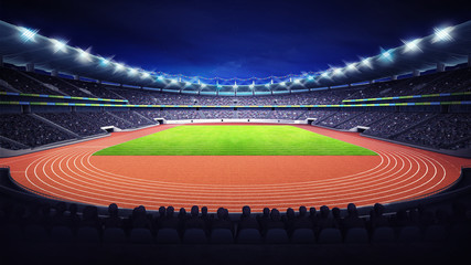 athletics stadium with track and grass field at front night view © LeArchitecto