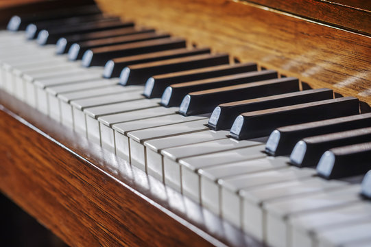 Close up of piano keyboard with limited depth of field