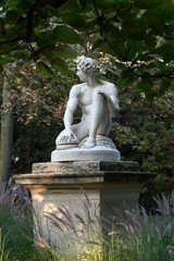 Fototapeta na wymiar Paris - Luxembourg Gardens. Sculpture of Archidamas by Philippe Joseph Henri Lemaire