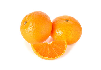 whole and sliced orange on white background