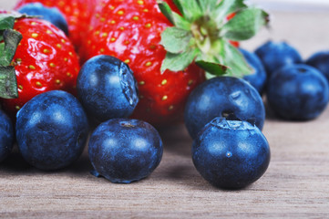 Blueberries and strawberries closeup