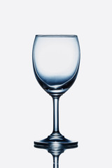 Empty wine glass isolated on a white background