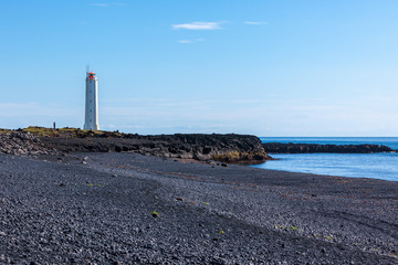 Fototapeta na wymiar Lighthouse in West Iceland at sunny weather