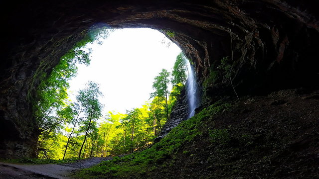 A large cave and waterfall, Gorski kotar, Croatia, full hd video