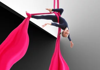 Rolgordijnen child hanging upside down on aerial silks © Cherry-Merry