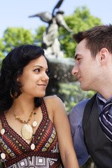 Fototapeta premium Young couple gazing into each other's eyes.
