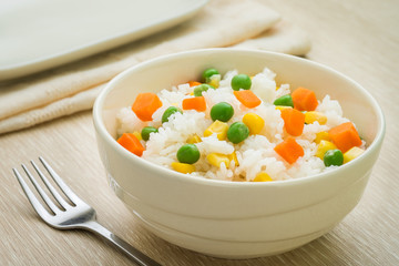 Rice with vegetables in bowl