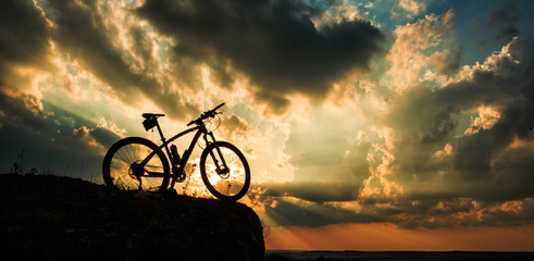 Beautiful scene of bike on sunset