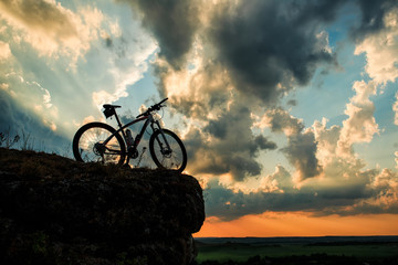 Beautiful scene of bike on sunset