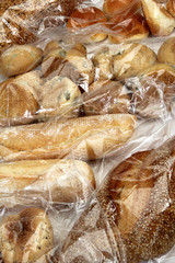 bread and cookies stored in cellophane bags