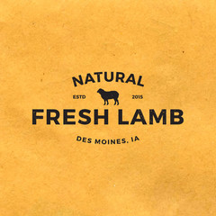 premium lamb label with grunge texture on old paper background © igorrita