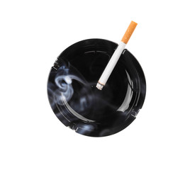 Black ashtray and smoking cigarette.