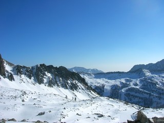 Snowy winter landscape in the mountains, in the French ski resort Isola 2000 in the Alps, on a...