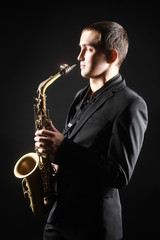 Fototapeta na wymiar Saxophone Player Saxophonist jazz man with Sax alto