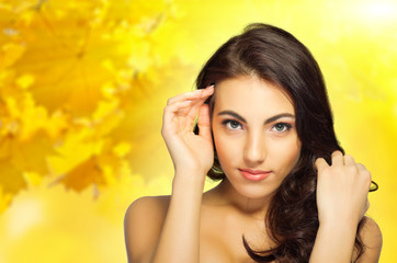 Young girl on autumnal background