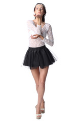 Girl in artistic make up sending air kiss