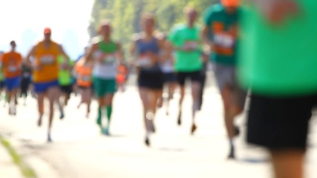Blurred mass of people marathon runners 