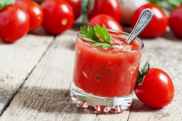 Tomato juice with vegetables and fresh tomato, selective focus