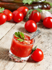 Tomato juice with vegetables and fresh tomato, selective focus