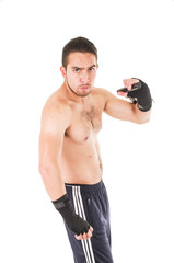 Fototapeta na wymiar tough martial arts fighter wearing black shorts and wristband