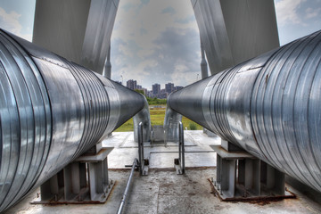 Hot water pipeline, crossing river