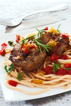 Stewed beef with pasta and vegetables