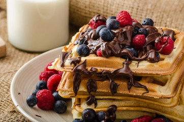 Waffles with fruits and chocolate