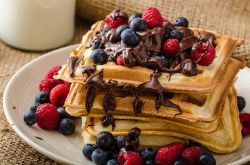 Waffles with fruits and chocolate