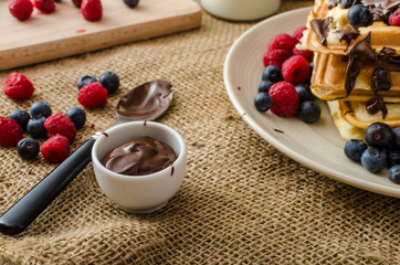 Waffles with fruits and chocolate