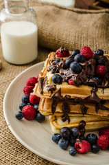 Waffles with fruits and chocolate
