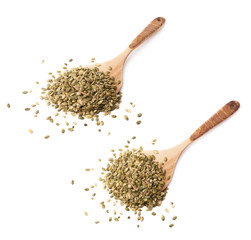 Wooden spoon covered with pumpkin seeds