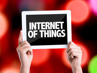 Tablet pc with text Internet of Things with bokeh background