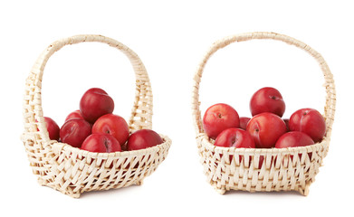 Wicker basked filled with plums