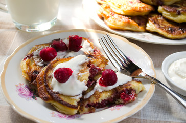 Breakfast with pancakes and milk