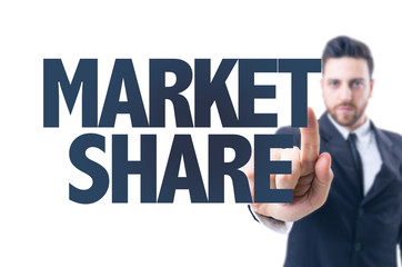 Business man pointing the text: Market Share