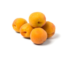 Ripe juicy apricots. Isolated on white background