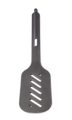 Used black plastic spatula isolated